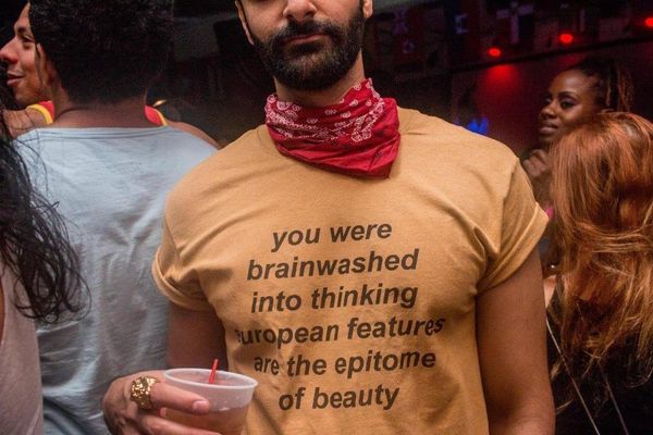 

you were brainwashed into thinking european features are the epitome of beauty funny graphic t-shirt yellow clothes tee girl top, White