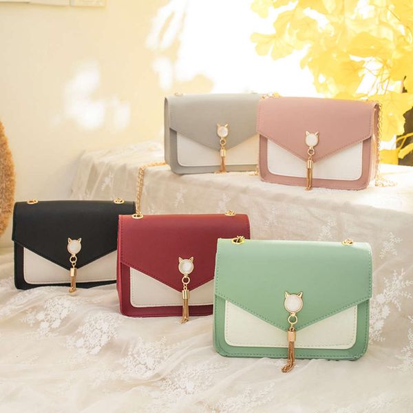 

2021 japan and south korea new hardware tassel women's leisure small square single shoulder messenger bag color contrast mobile