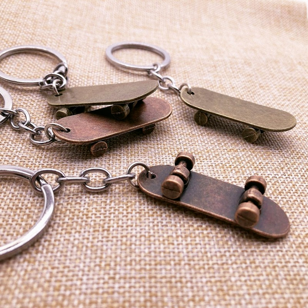

10pieces/lot european and american retro heavy metal element skateboard keychain bag car pendant accessories, Silver