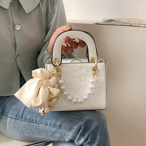 

new xiaoxiangfeng animation women's bag embossing graffiti diana s messenger pearl hand
