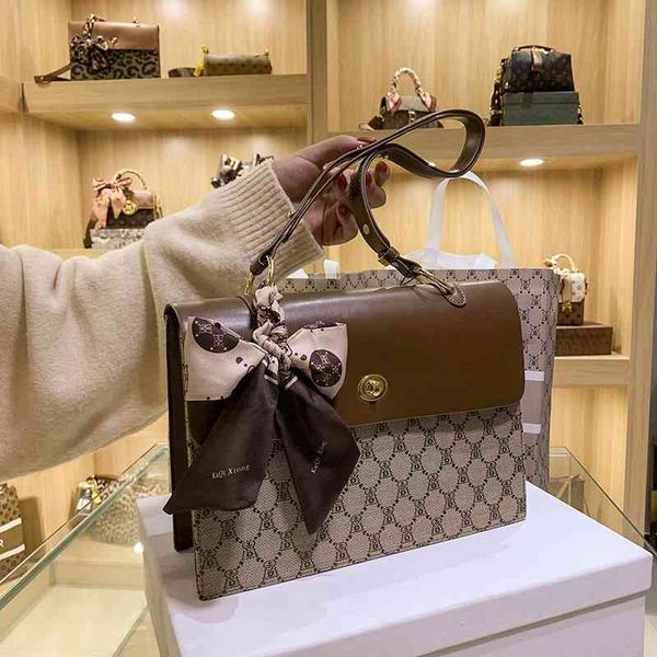 

design commuter tote women's new fashion high-capacity briefcase single shoulder oblique span difference bag handbags
