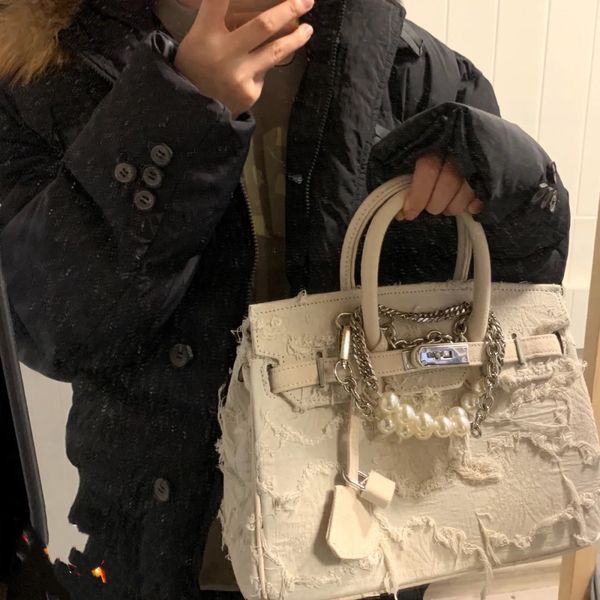 

small group vivintagdiy hand made denim and beggars' canvas patchwork handbag