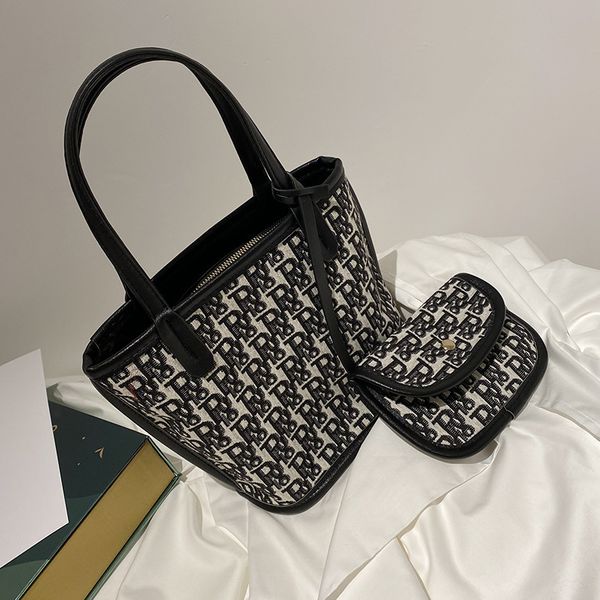 

designer handbags embroidered canvas portable women's 2021 new chaocai basket single shoulder armpit mother's small bag bucket bag