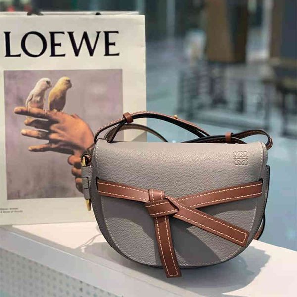 

handbag hookloewe / luo yiwei saddle gate litchi grain cowhide flap women's business one shoulder diagonal bagluggage tag