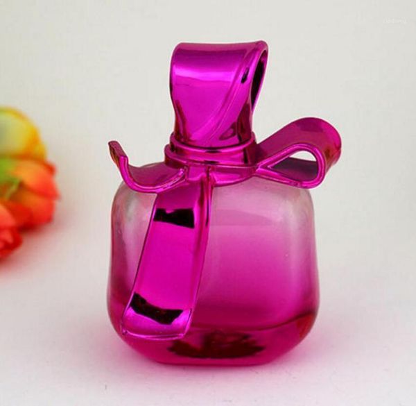 

100pcs/lot 20ml creative bow refillable portable mini perfume bottle glass spray atomizer empty storage bottles & jars