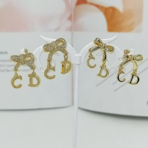 

design jewelry new bow with exquisite inlaid letters women's ear pendant bright gold girls' earrings, Golden