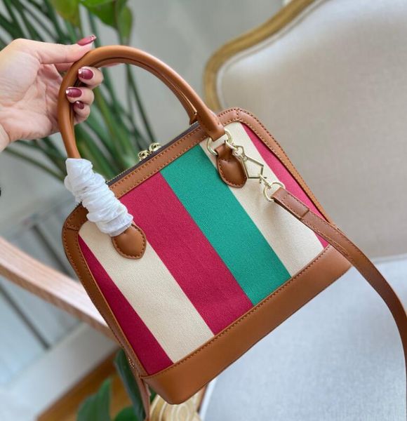 

21ss new lady shell bag, star shape design, classic double g logo on the of the leather label and zipper, size 25cm