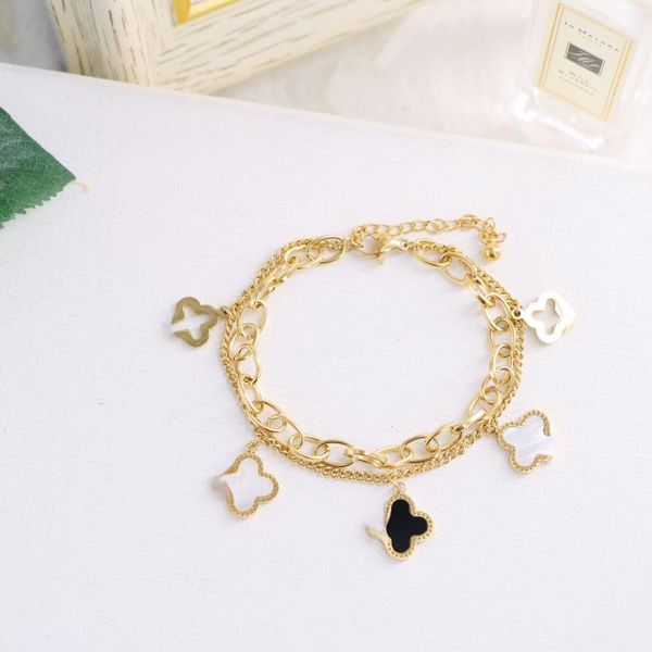 

charm bracelets titanium stainless steel double bracelet lucky hollow four-leaf clover black and white fritillary women, Golden;silver
