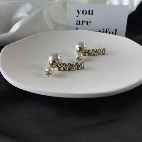 

christian/dio jewelry d family letter make old brass color keeping lady inlaid with diamond pearl five pointed star earrings, Red;brown