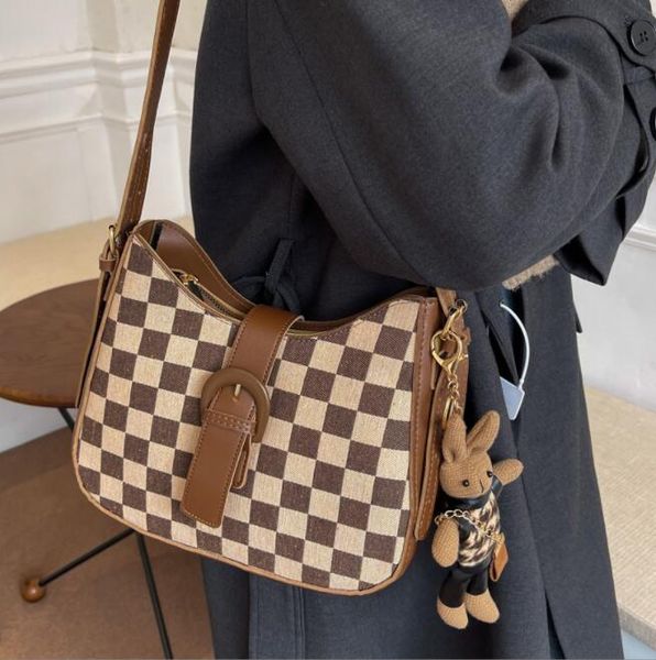 

wholesale personality check shoulder bags european and american popular checkerboard pattern women handbag sweet and lovely cartoon pendant