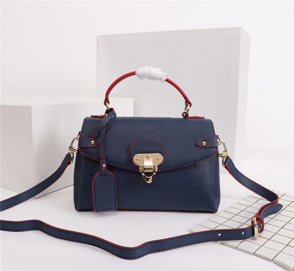

female luxury hand,fashionable handbag shoulder bag