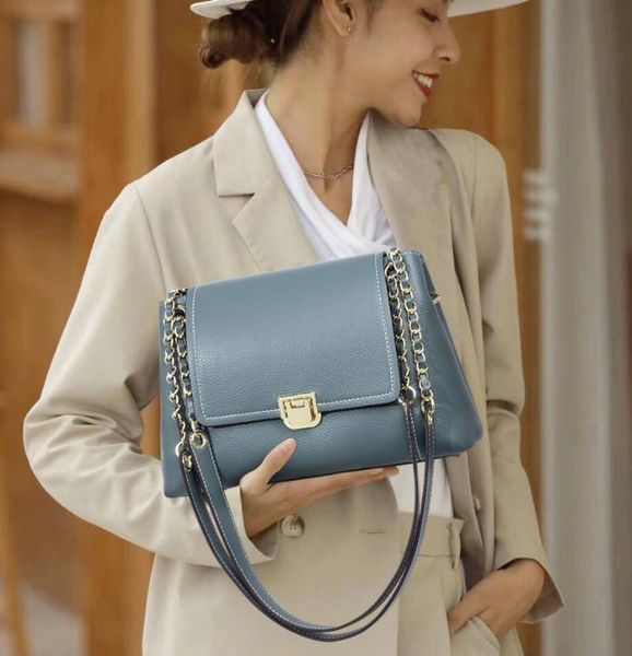

fashion head leather women's bag portable one shoulder messenger leather commuter bag women's embossed decoration