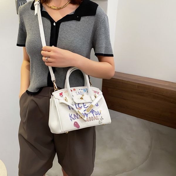 

new design of hand-held 2021 graffiti litchi pattern bag for women