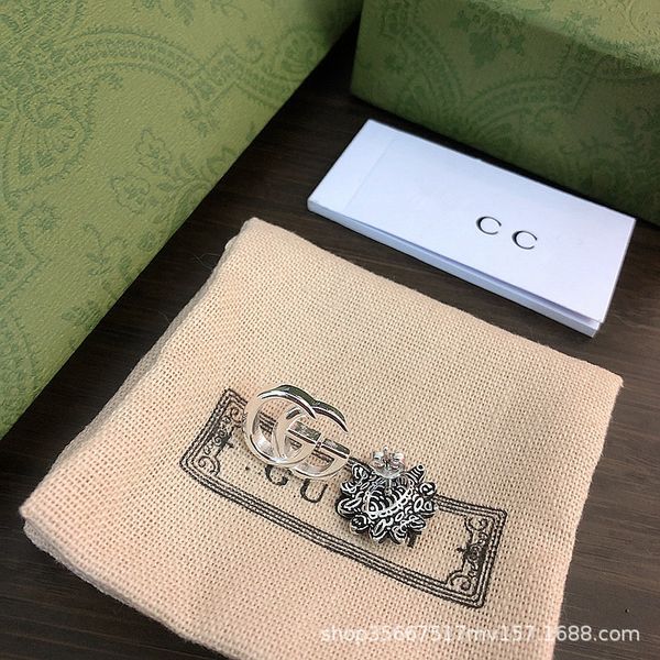 

ladies fashion jewelry small daisy s925 mutual buckle type couple double flower twist earrings, Golden;silver