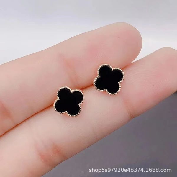 

clover earrings female version fashion earrings simple net red temperament