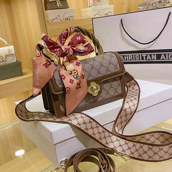 

2022 factory outlet online bags french sense niche bag women's embossed wide shoulder strap style versatile messenger single
