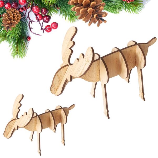 

christmas decorations wood table with tree reindeer and santa claus
