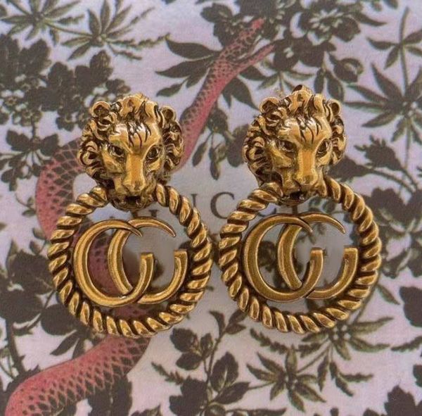 

aaa designer jewelry 925 silver needle gujia double lion head earrings temperament net red lion head earrings female, Golden