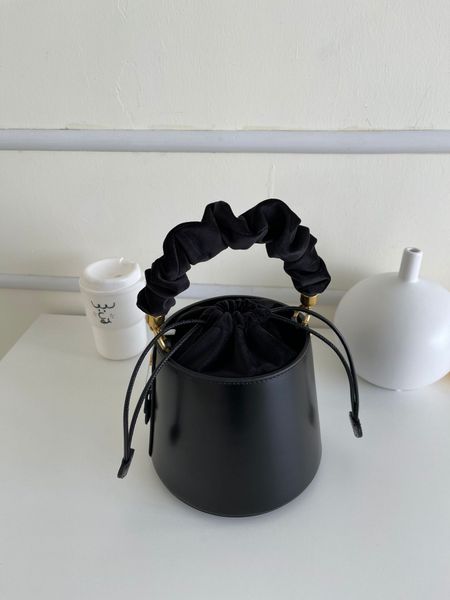 

japanese retro style cowhide drawstring shoulder portable crossbody literary bag