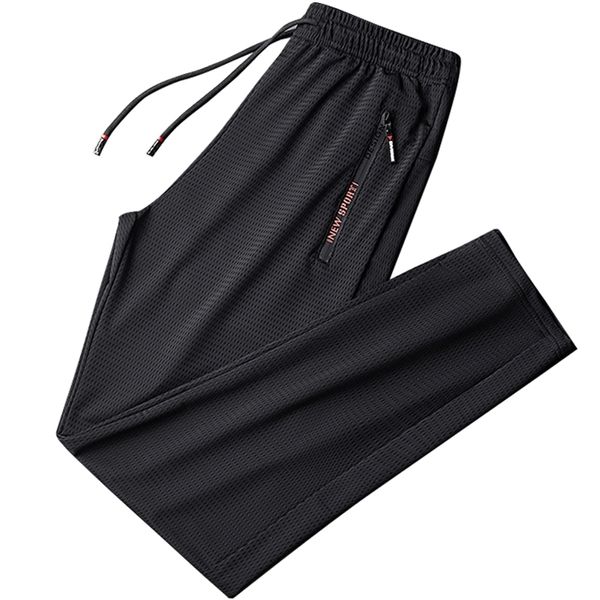 Pantaloni sportivi estivi in mesh traspirante nero Pantaloni sportivi Abbigliamento sportivo Pantaloni larghi Pantaloni casual da uomo Plus Size 7XL 8XL 9XL 211013