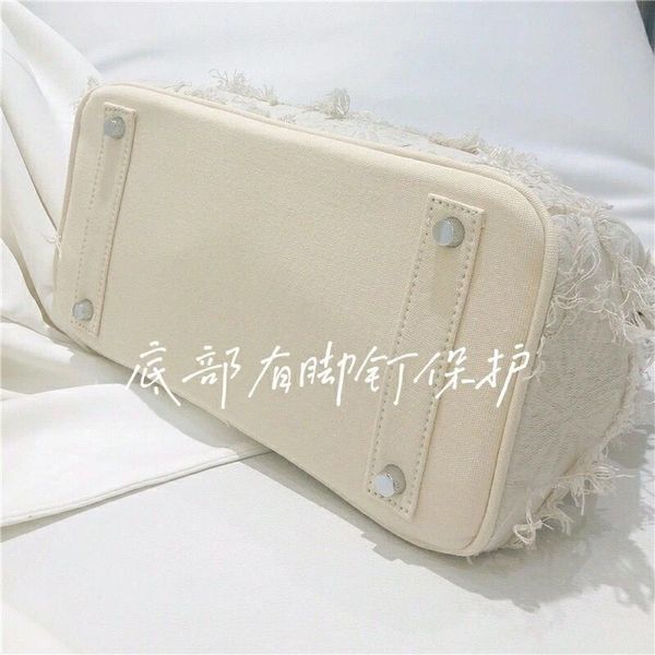 

louis vutton baga small number of retro hand-made denim, platinum military cloth, canvas kelly handbag, patching beggars' bagsandd1y_to