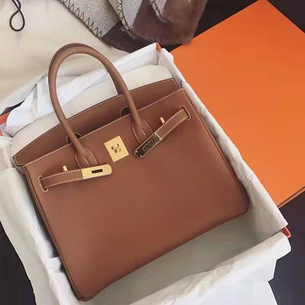 

boots bag handbag designer bag luxury classic vintage himalayan leather gold mouth platinum tote