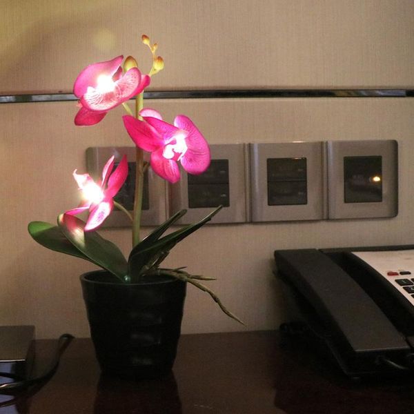 

3 led battery lighted orchid flower bonsai with 2* battery pot ,height of 25cm 3 orchid flowers with buds 9 colors available