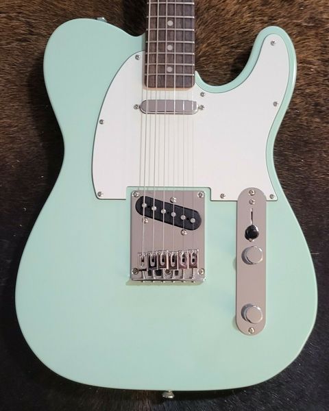 

squier electric guitar - seafoam green