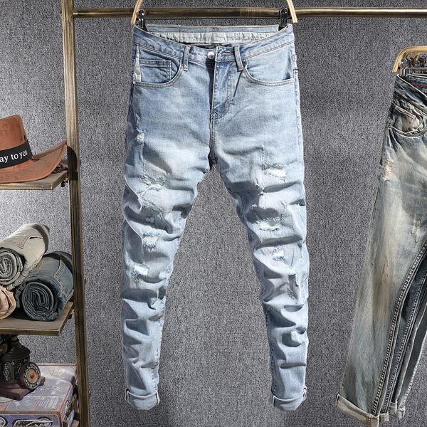

2021 new korean style fashion men jeans retro light blue elastic ripped denim pencil pants streetwear designer slim fit hip hop trouser leuz
