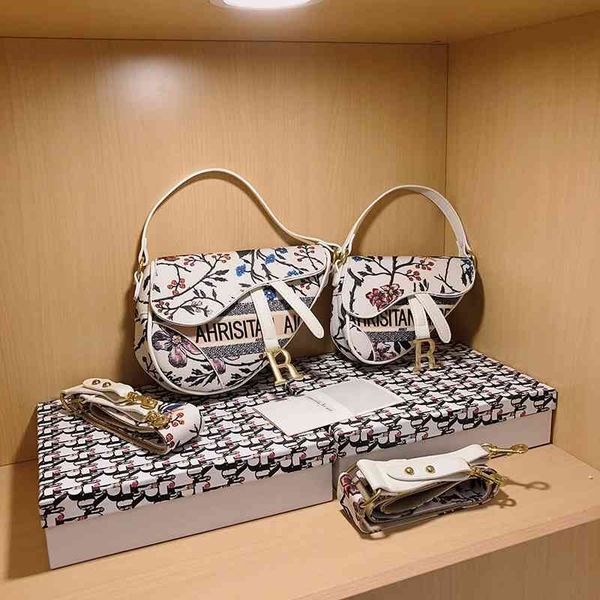 

factory store 65% off clearance sale handbags underarm women's 2021 texture canvas saddle bag horseshoe bag wide shoulder belt embroide, Black;red