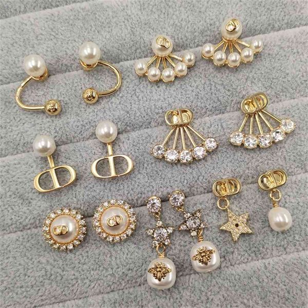 

2021 luxury designer jewelry pearl earrings female diamond star asymmetric sector high version, Silver