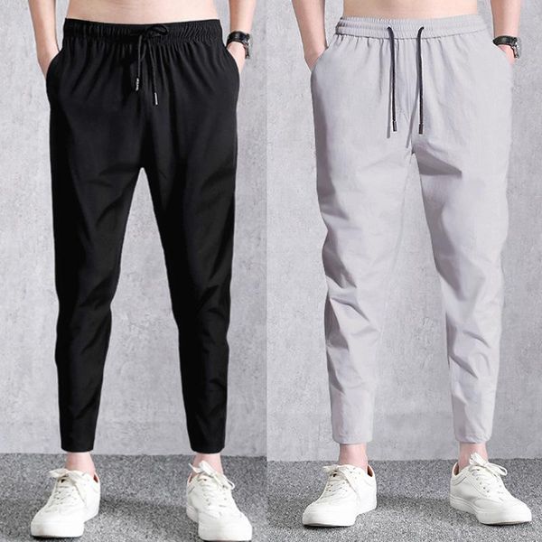

casual men's ninth pants ice silk stretch feet straight-through closing pants male quick-drying man fashion pant, White;black
