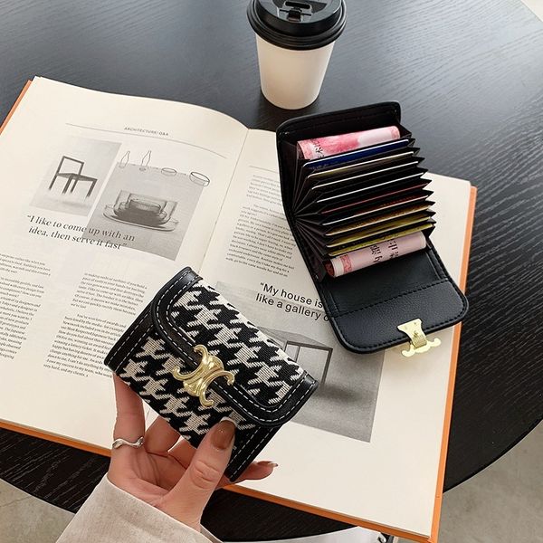 

ouhuochao brand qianniaoge wallet three fold rivet short multi card bag, Red;black