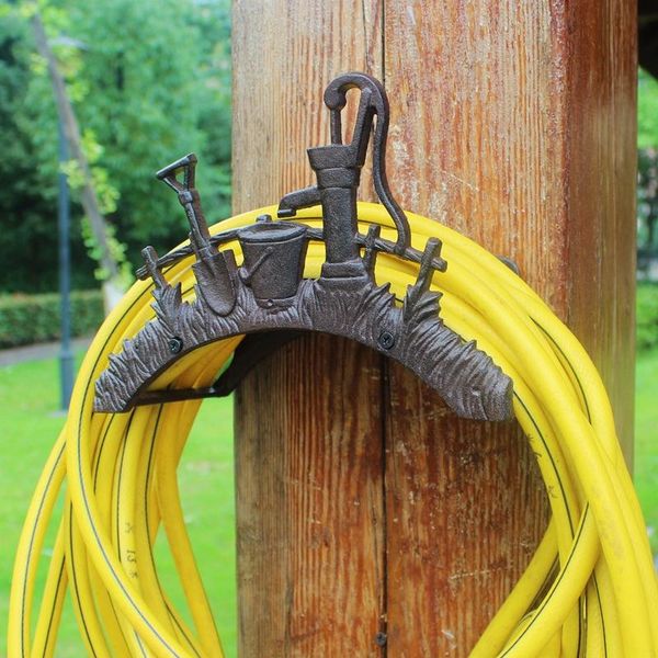 

european vintage country accent rustic water pump shovel spade design home garden decor cast iron wall mounted water pipe holder