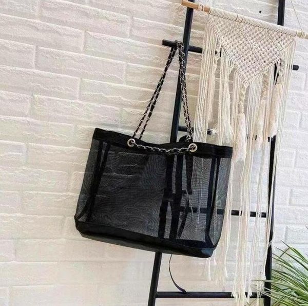 

2021 temperament beach makeup bag black spring and summer style fashion gauze net handbag cosmetics shop beauty handbag style shopping bags