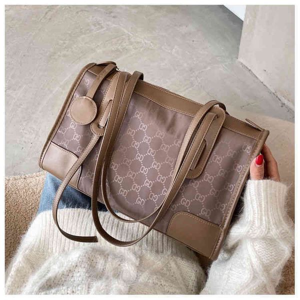 

2022 factory wholesale oxford butot female korean version light shoulder large capacity waterproof nylon canvas bag