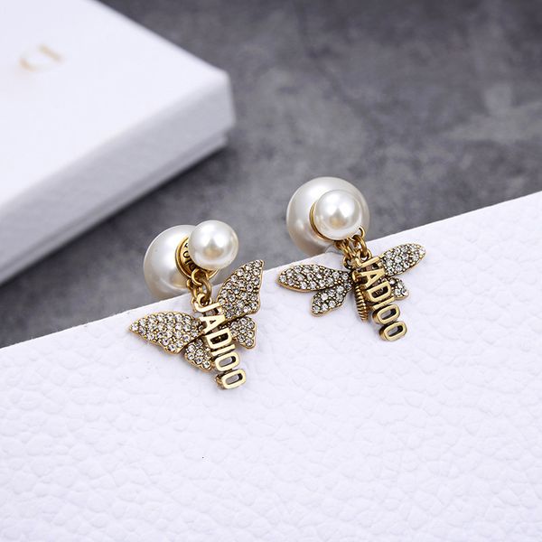 

d family brass 925 sier needle pearl earrings and butterfly asymmetric earrings simple style, Golden