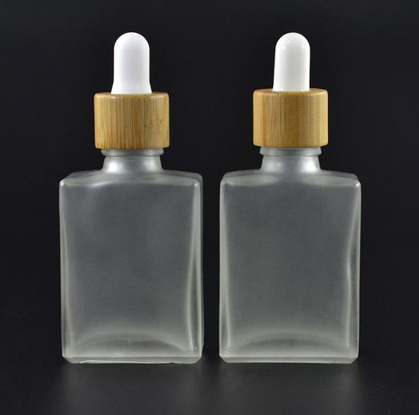 Bottiglie contagocce in vetro trasparente / smerigliato da 30 ml Reagente liquido Bottiglie di profumo di olio essenziale quadrato Bottiglie di olio di fumo e liquido Tappo di bambù SN2386