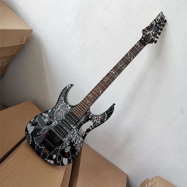 Linkshänder-E-Gitarre mit schwarzem Korpus und Lebensbaum-Inlay sowie Palisander-Griffbrett, kann individuell angepasst werden