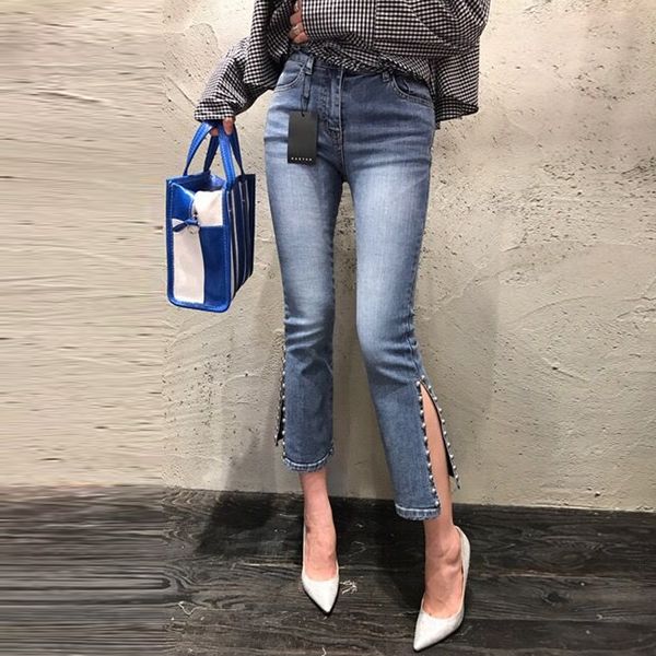 

2021 new autumn high waist side split beading flared women fashion nine jean casual streetwear femme blue ny denim m0mq