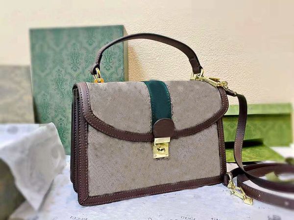 

designer design handbag, brand women's bag, with long belt can be slanted. the size is 25cm.