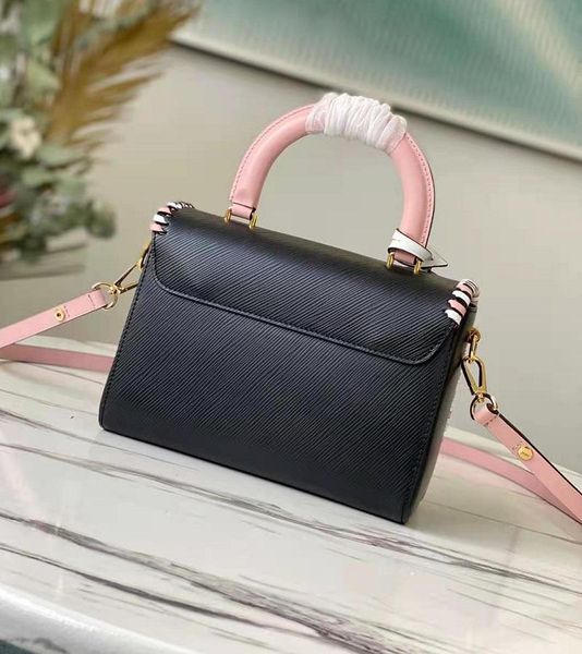 

new fashion twist medium bag lock and slide chain contrast color collision wwomen handbag luxury handbags1