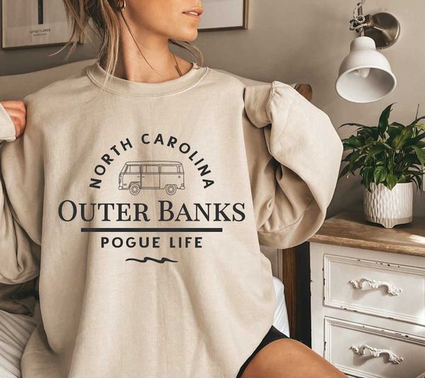

trending outer banks north carolina sweatshirt funny pogue life shirt outer banks paradise on earth hooide obx tv 210930, Black