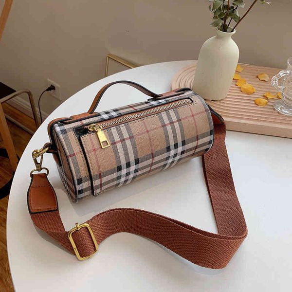 

backpack korean cylinder small bag, western style, classic pop lattice messenger street one shoulder round bag, Black;red