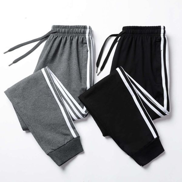 

cotton sports men's spring and autumn leisure waist leggings small foot knitted three bar nine point pants, Blue