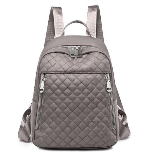 

backpack 2021 waterproof fabric female shoulder bag capacity simple style casual