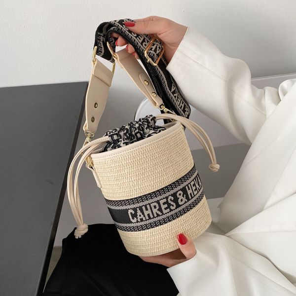 

design s new style wind street beat color contrast straw woven pumping bucket single shoulder oblique cross trend women's bag