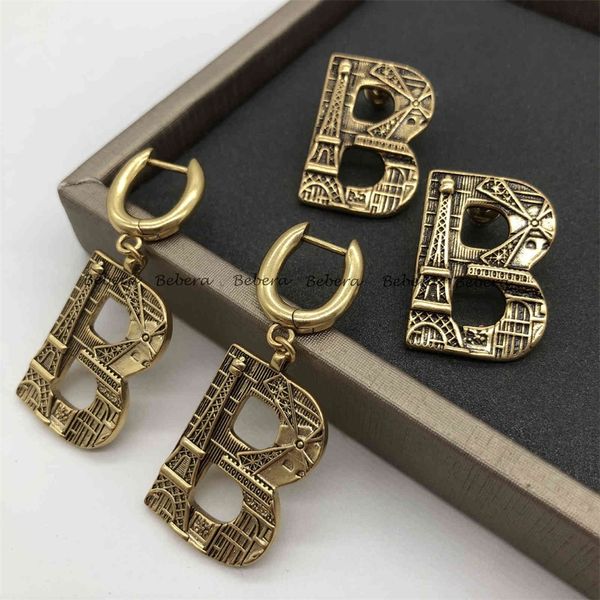 

gold made old celebrity iron tower embossed earrings jewellry deals, Silver