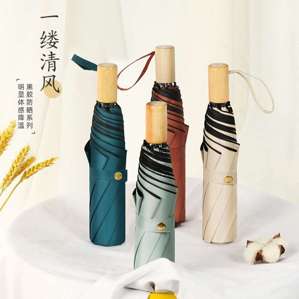 

three fold umbrella with wood handle and black glue