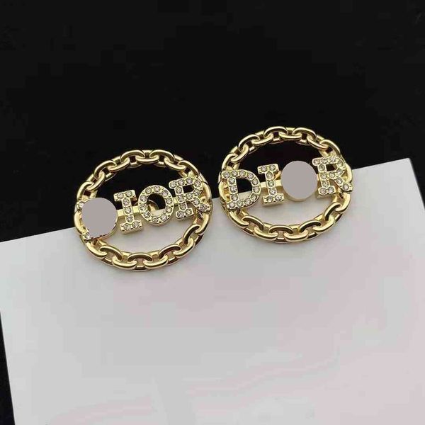 

luxury designer fashion dijia / dejia 21 new cd letter temperament silver needle earrings brass senior personality women, Red;brown